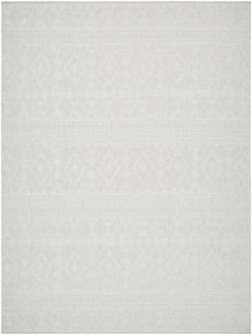 Close-up of the Choire Area Rug, a light silver rug with a subtle geometric diamond pattern and woven texture. Design-Rectangle-537