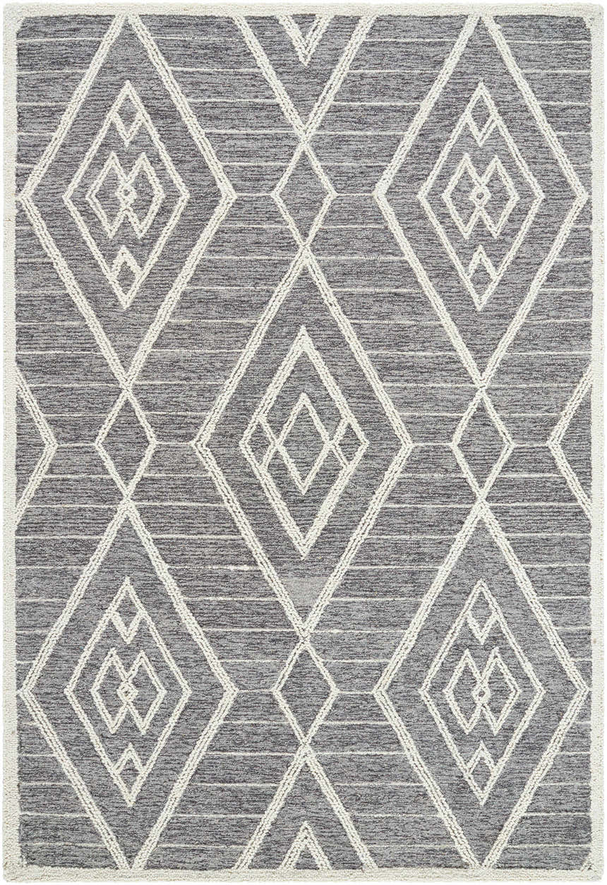 Close-up of the Ceanna Area Rug. Gray wool rug with off-white geometric diamond pattern. Hand-tufted texture. Design-Rectangle-576