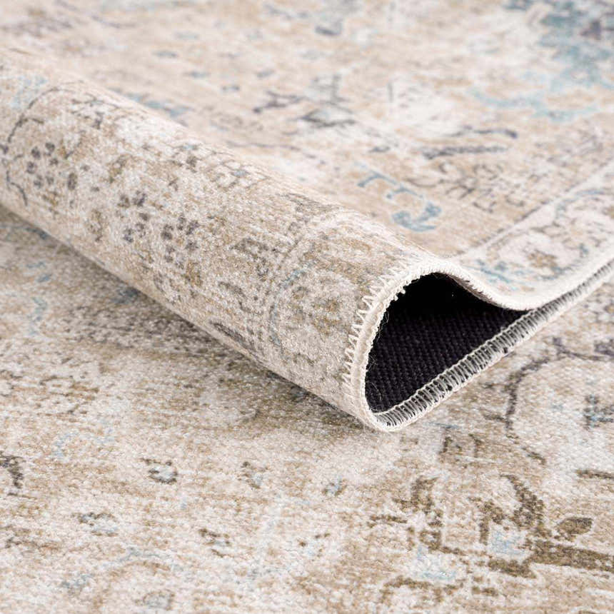 Close-up of the Beige Holi-4600 Washable Area Rug, showing its traditional vintage pattern and soft, neutral cream and brown colors. Fold