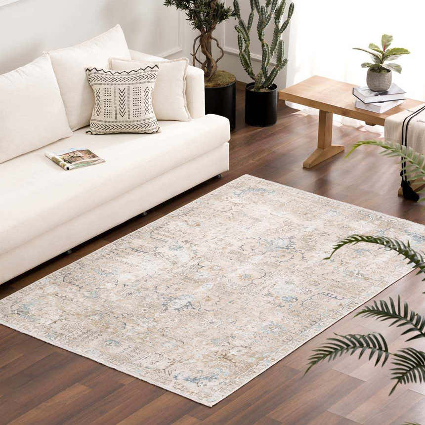 Living room scene with a Beige Holi-4600 Washable Area Rug, cream sofa, wood floor, and plants. Farmhouse style. Roomscene-Rectangle