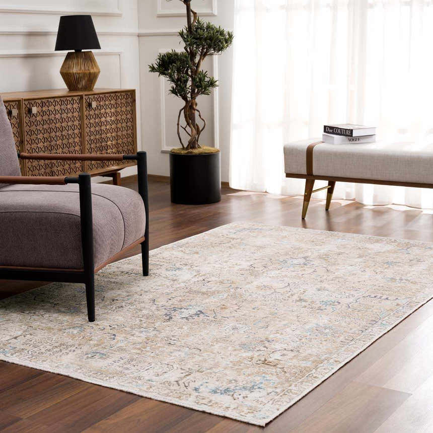 Living room scene with Beige Holi-4600 Washable Area Rug, brown wood floors, console table, and armchair. Roomscene-Rectangle