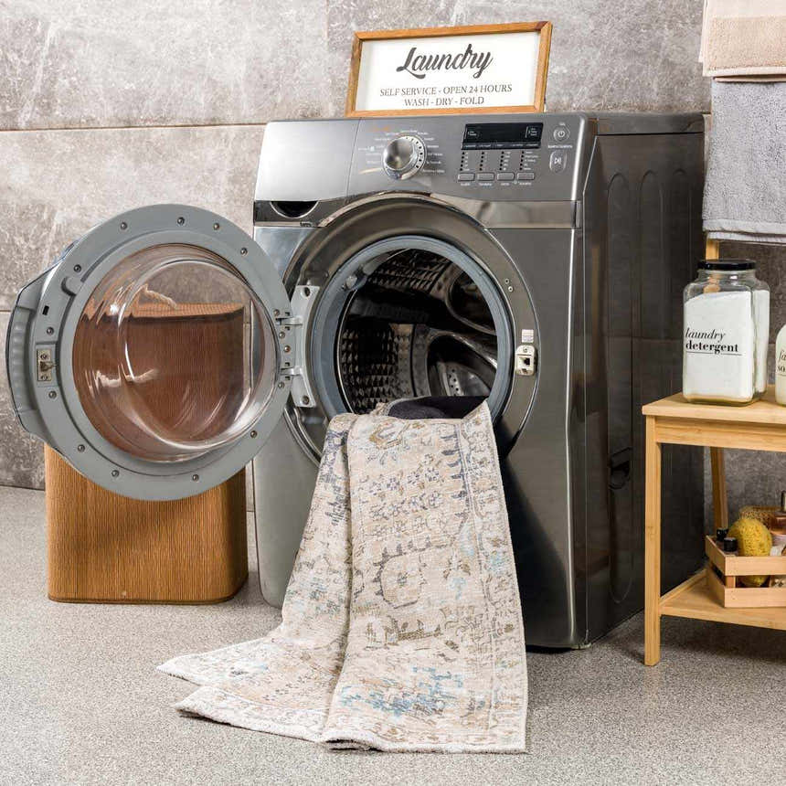 Beige Holi-4600 Washable Area Rug in a laundry room with a washing machine and laundry basket. Washing-Machine