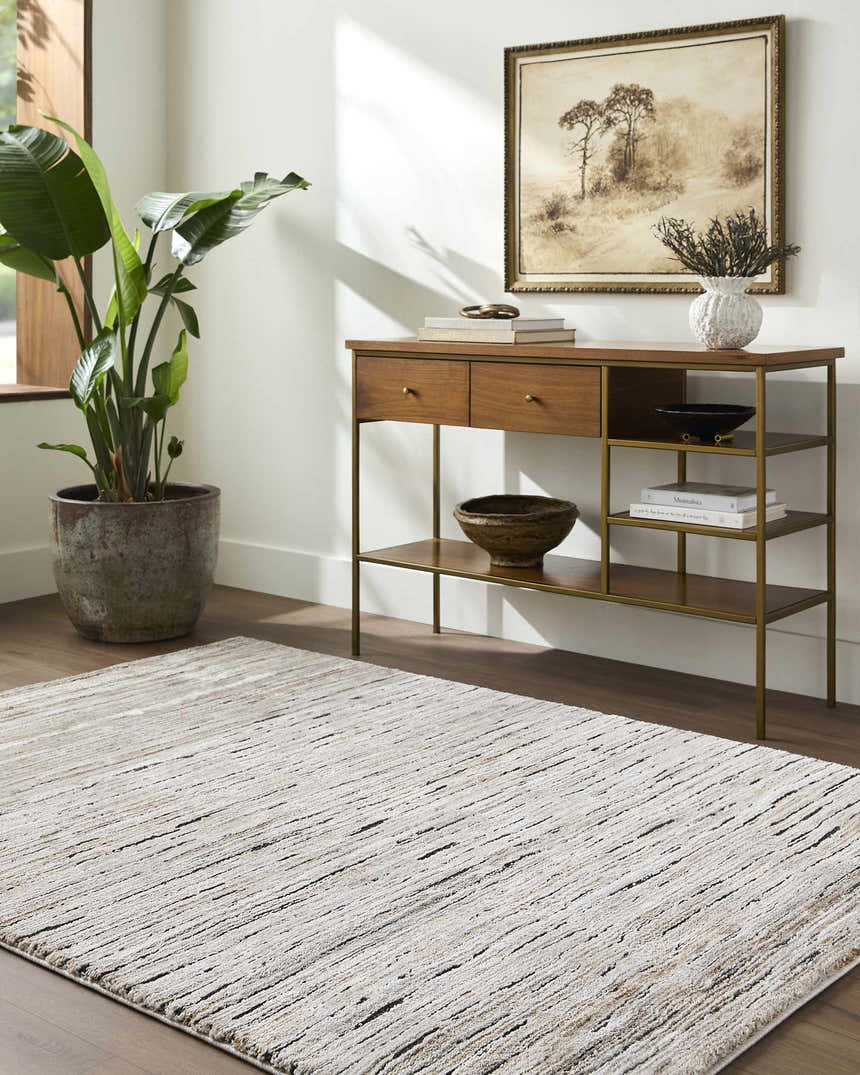 Living room scene with a tan console table and the Wantu Luxe Thick Area Rug in black, tan, and ivory. Roomscene-Rectangle