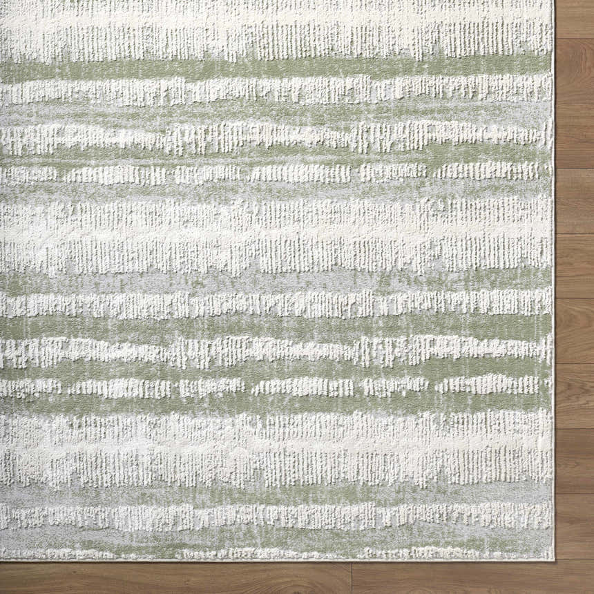 Close-up of the Asmara Green Area Rug, featuring a textured stripe pattern in sage, light silver, and silver gray. Corner