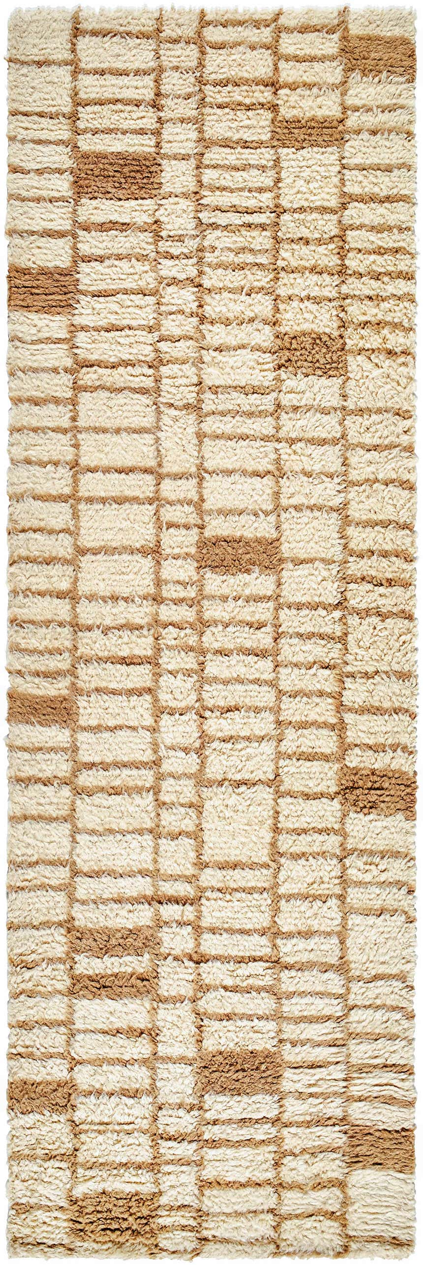 Close-up of the Anusha Area Rug. Beige and tan wool rug with a contemporary geometric block pattern. Hand-tufted texture. Design-Runner-268