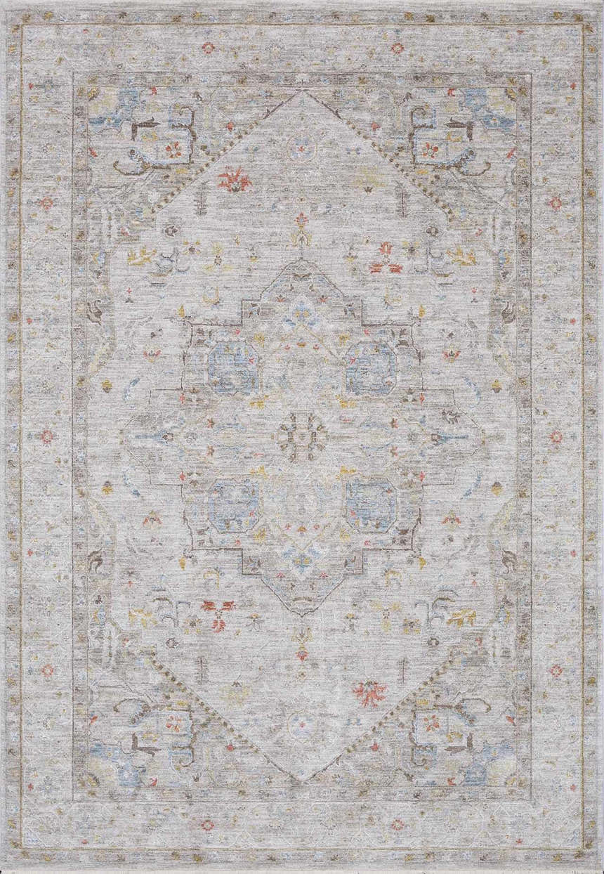 Close-up of the Engin Thick Luxe Area Rug. Features a traditional pattern in amber, gray, blue, and pink hues. Design-Rectangle