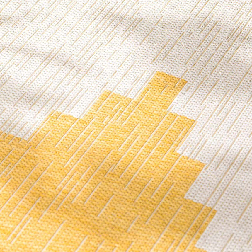 Close-up of the Djugun Yellow Outdoor Rug showing geometric pattern and woven texture. Beige and gold hues. Texture