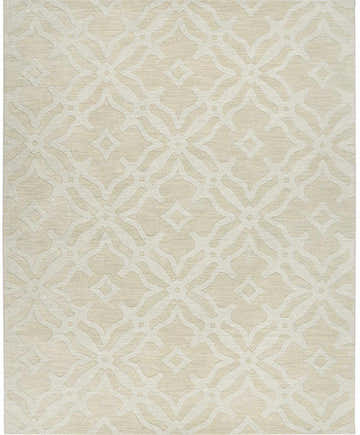 Close-up of the Fyffe Embossed Beige Wool Area Rug, showcasing its geometric pattern and soft, neutral color. Design-Rectangle