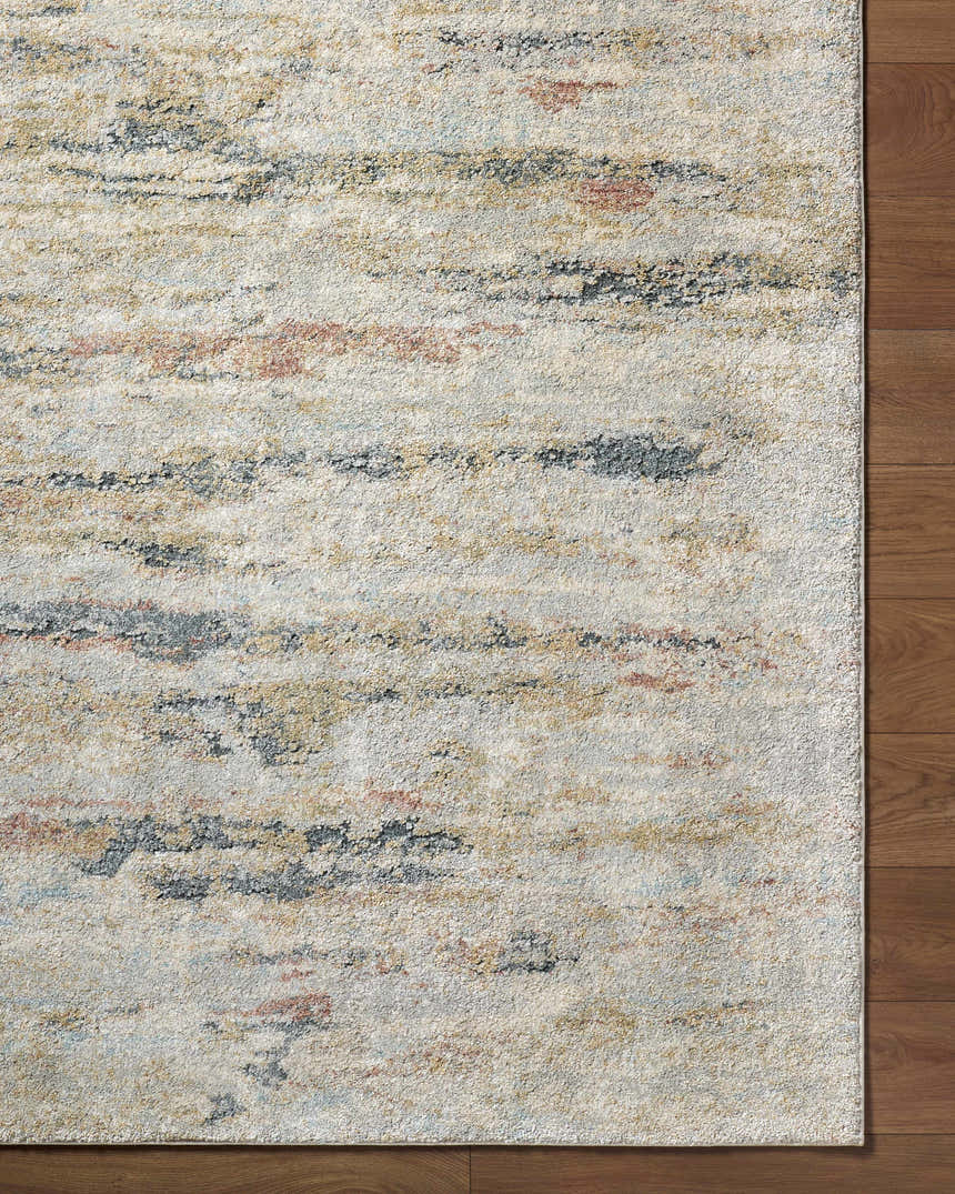 Close-up of the Attila Thick Luxe Area Rug showing beige, pink, gray, and teal horizontal striations. Corner