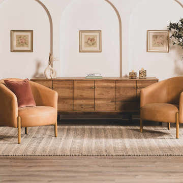 Living room scene with tan chairs and Hanston Handmade Faux Silk Rug in light beige. Contemporary, Scandinavian style. Roomscene-Rectangle