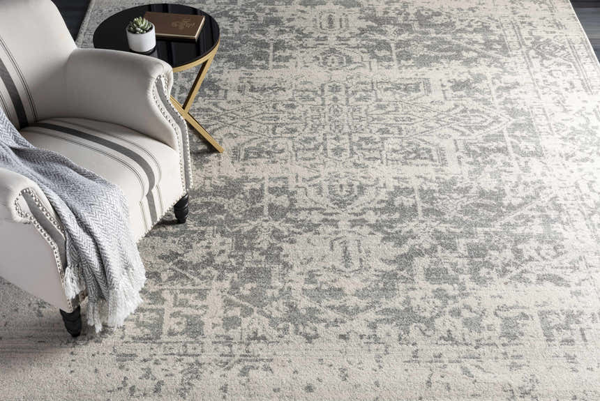 Farmhouse living room scene with Livabliss Harput HAP-1024 charcoal, gray, and off white area rug. Styleshot
