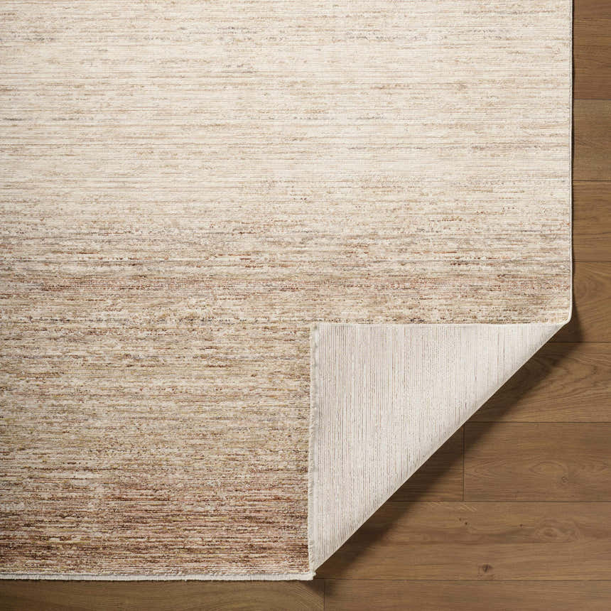 Close-up of the Amaury Area Rug showing a cream, dark brown, and medium gray horizontal pattern and texture. Fold