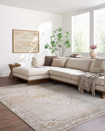 Living room scene with a neutral sectional sofa and Havard Off White Area Rug with a traditional design. Roomscene-Rectangle