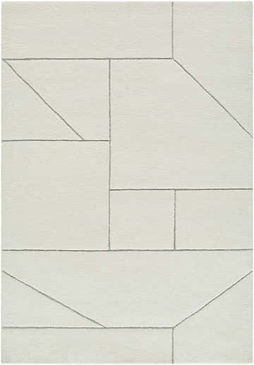 Close-up of the Alaina Area Rug; a hand-tufted wool rug in ivory with a charcoal geometric line pattern. Design-Rectangle-5377