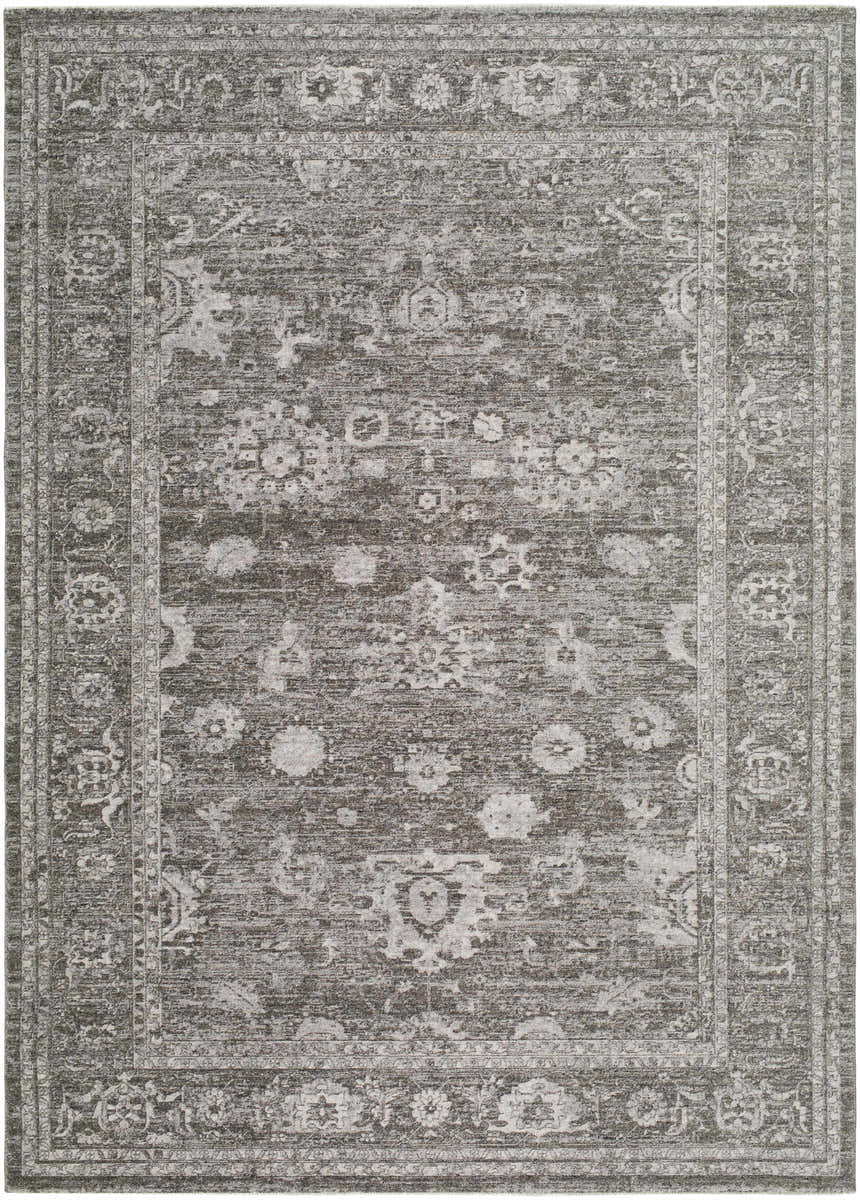 Close-up of the Haruna Area Rug, a machine-woven, rectangular rug with a traditional gray floral pattern and farmhouse style. Design-Rectangle-679
