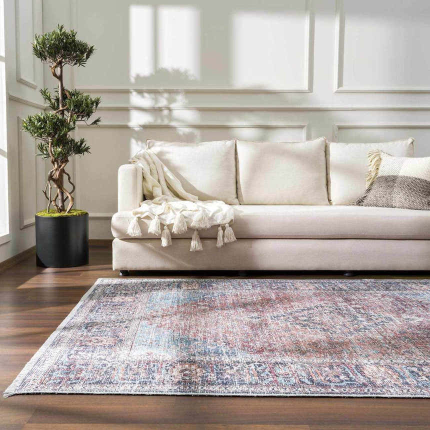 Living room scene with a beige sofa and Blue Burgundy Holi-2302 Washable Area Rug, adding a vintage touch to the decor. Roomscene-Rectangle