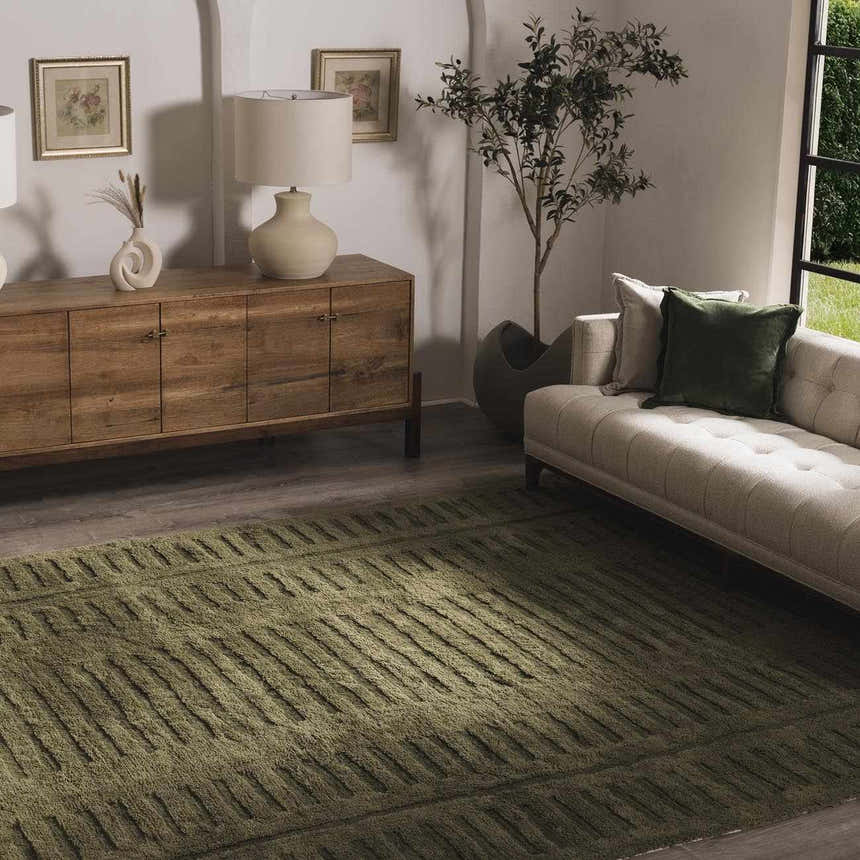 Living room with a beige sofa and a green Washable Wool Rug - Clearance with a geometric pattern. Roomscene-Rectangle