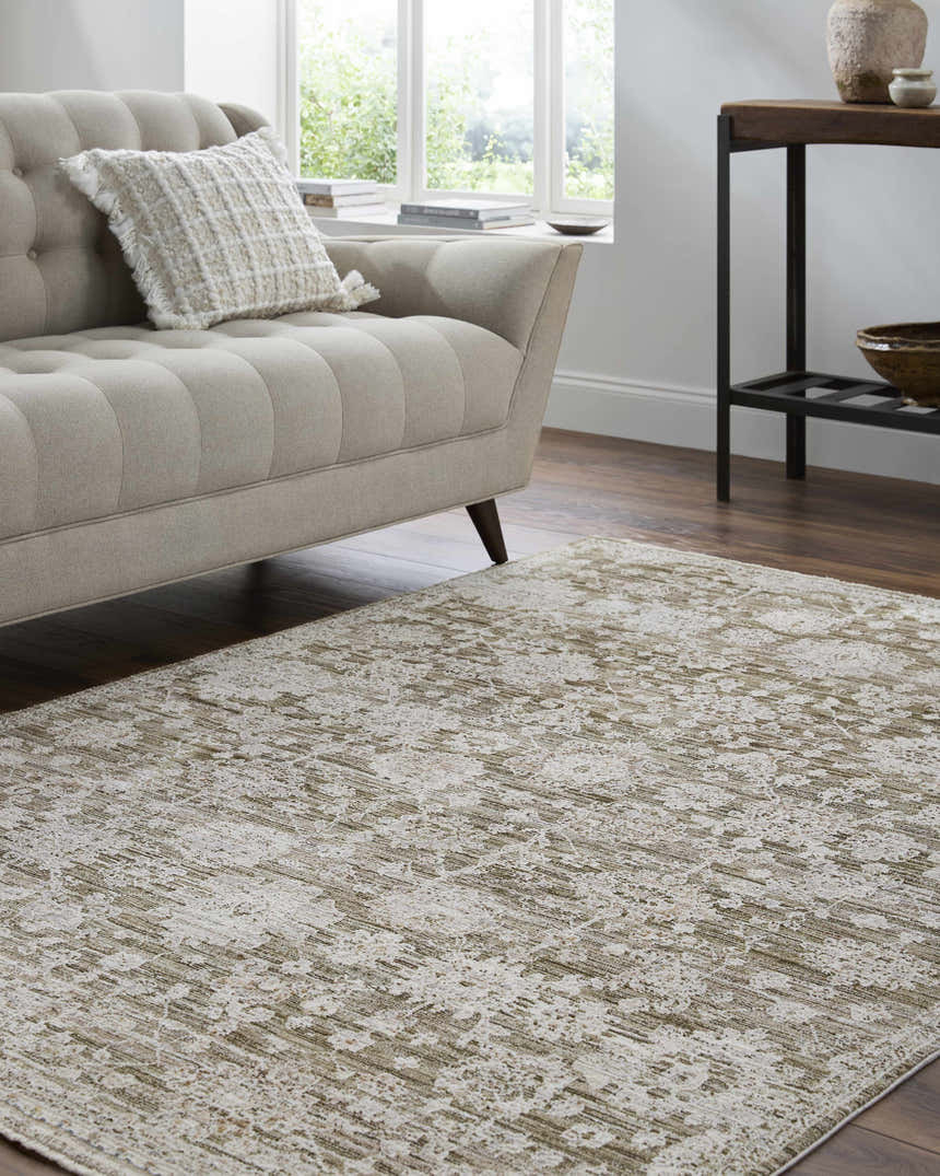 Living room scene with a neutral sofa and the Urara Green Area Rug on dark wood floors. Roomscene-Rectangle