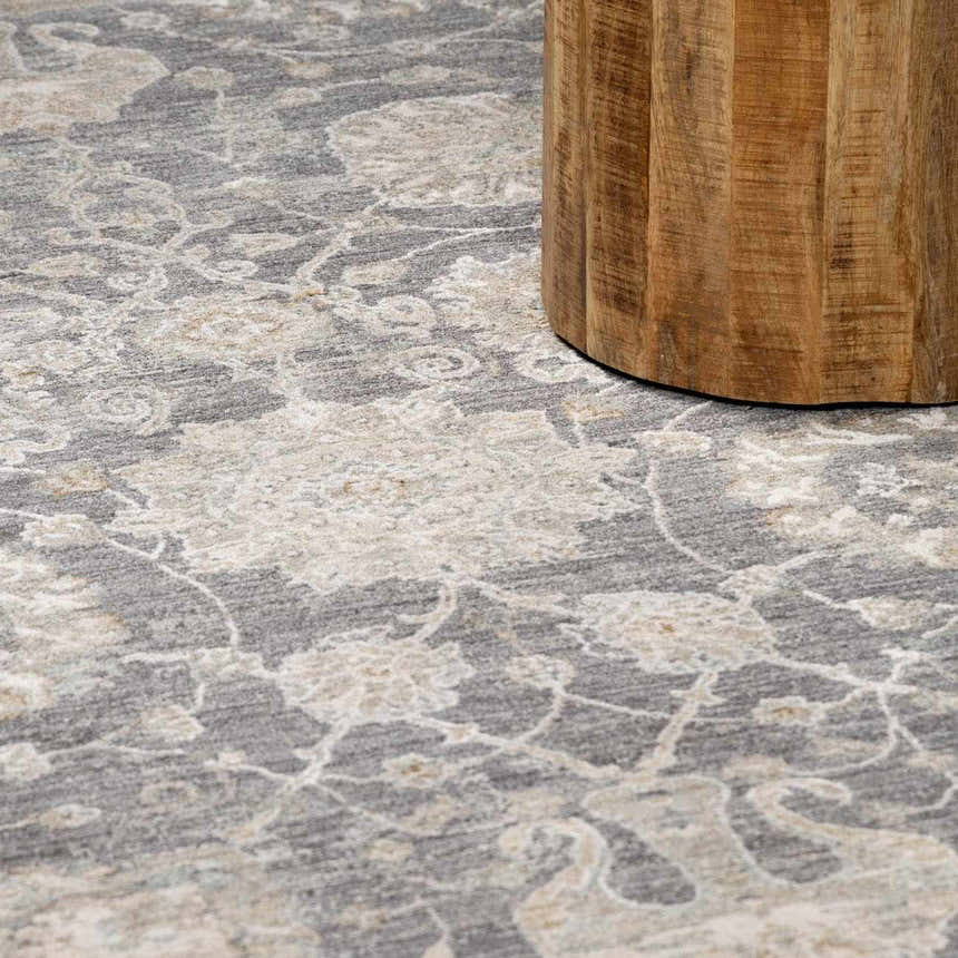 Close-up of the Kanimbla Thick Luxe Avant Garde Rug. Beige and gray floral pattern with a soft, luxurious texture. Styleshot