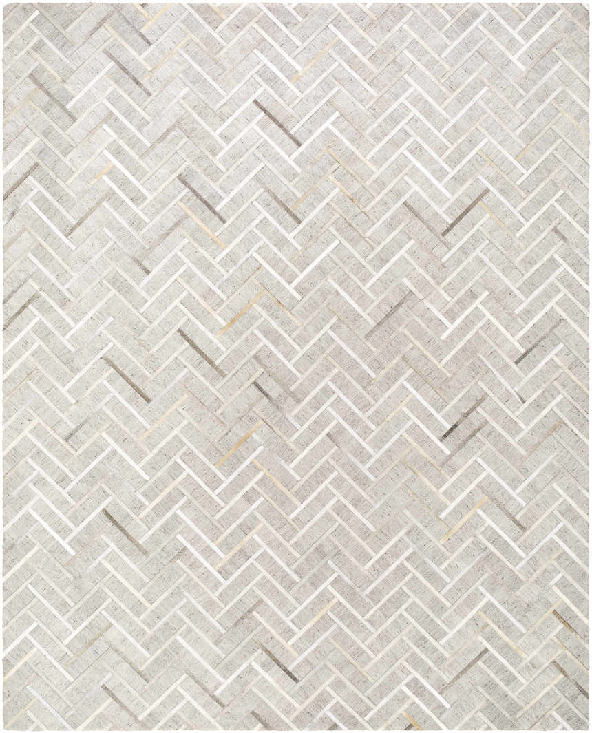 Close-up of the Karacasu Area Rug. Cream, light gray, and brown viscose rug with a contemporary herringbone pattern. Design-Rectangle-810