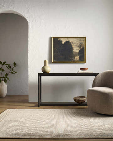 Living room scene with beige Kayoko Area Rug, console table, art, and neutral chair. Roomscene-Rectangle