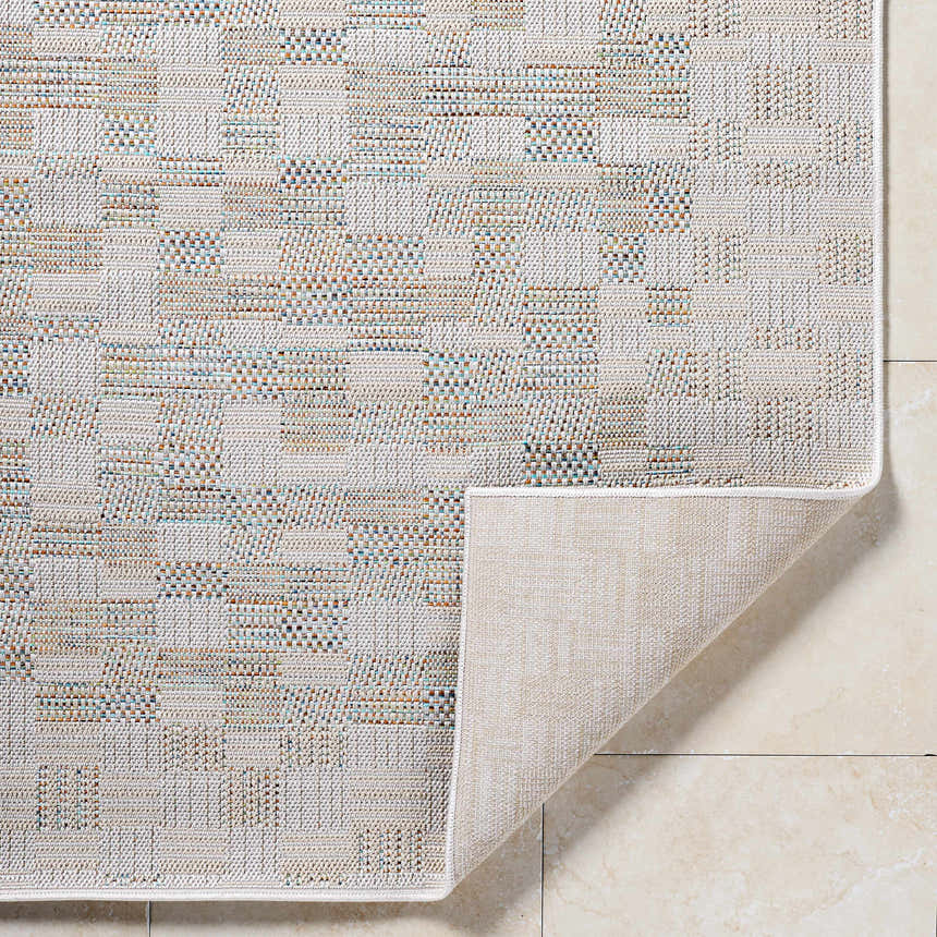 Close-up of the Arshad Ivory Area Rug showing beige, tan, and light gray woven pattern and rug backing. Fold