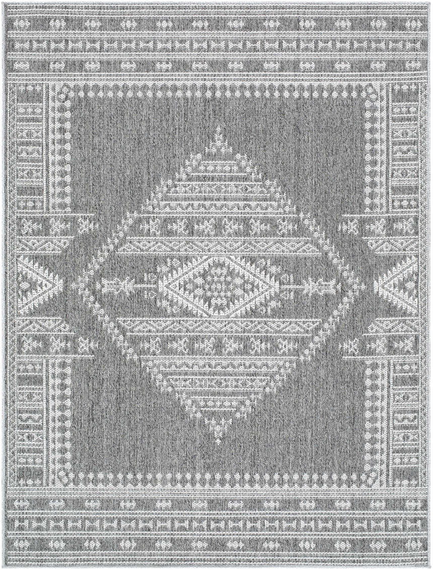 Close-up of the Asuman Area Rug. Gray rug with a white geometric diamond pattern and traditional farmhouse style border. Design-Rectangle-537