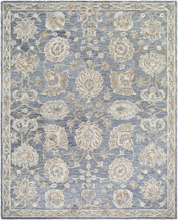 Close-up of the hand-tufted Ayesha Oushak Area Rug. Floral pattern in desert sand, light silver, and slate blue wool. Design-Rectangle-810
