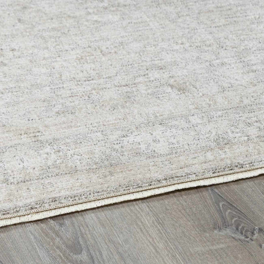Close-up of the Livabliss x Galey Alix Maria Elena V Vintage Medallion Area Rug showing ivory, tan, and brown tones. Corner