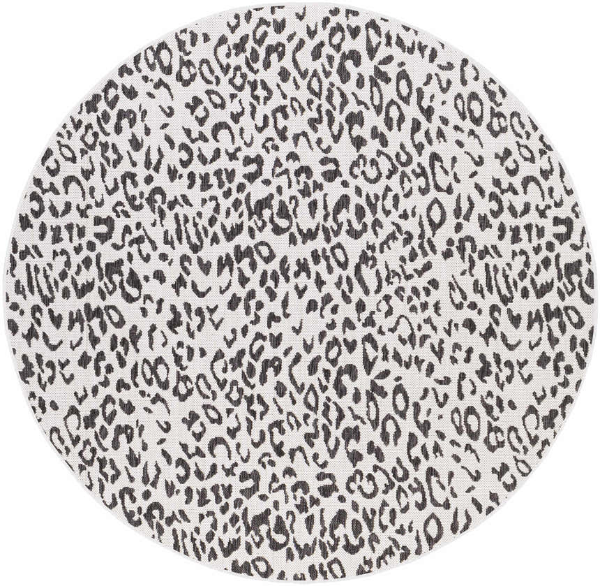 Close-up of round Alderbury White Leopard Print Rug. Black and charcoal spots on an off-white background. Design-Round-710