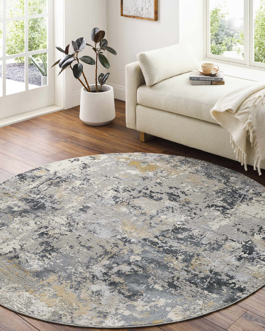 Bright living room with round Lenzburg Faux Silk Abstract Rug in charcoal, gray, and mustard tones. Roomscene-Round