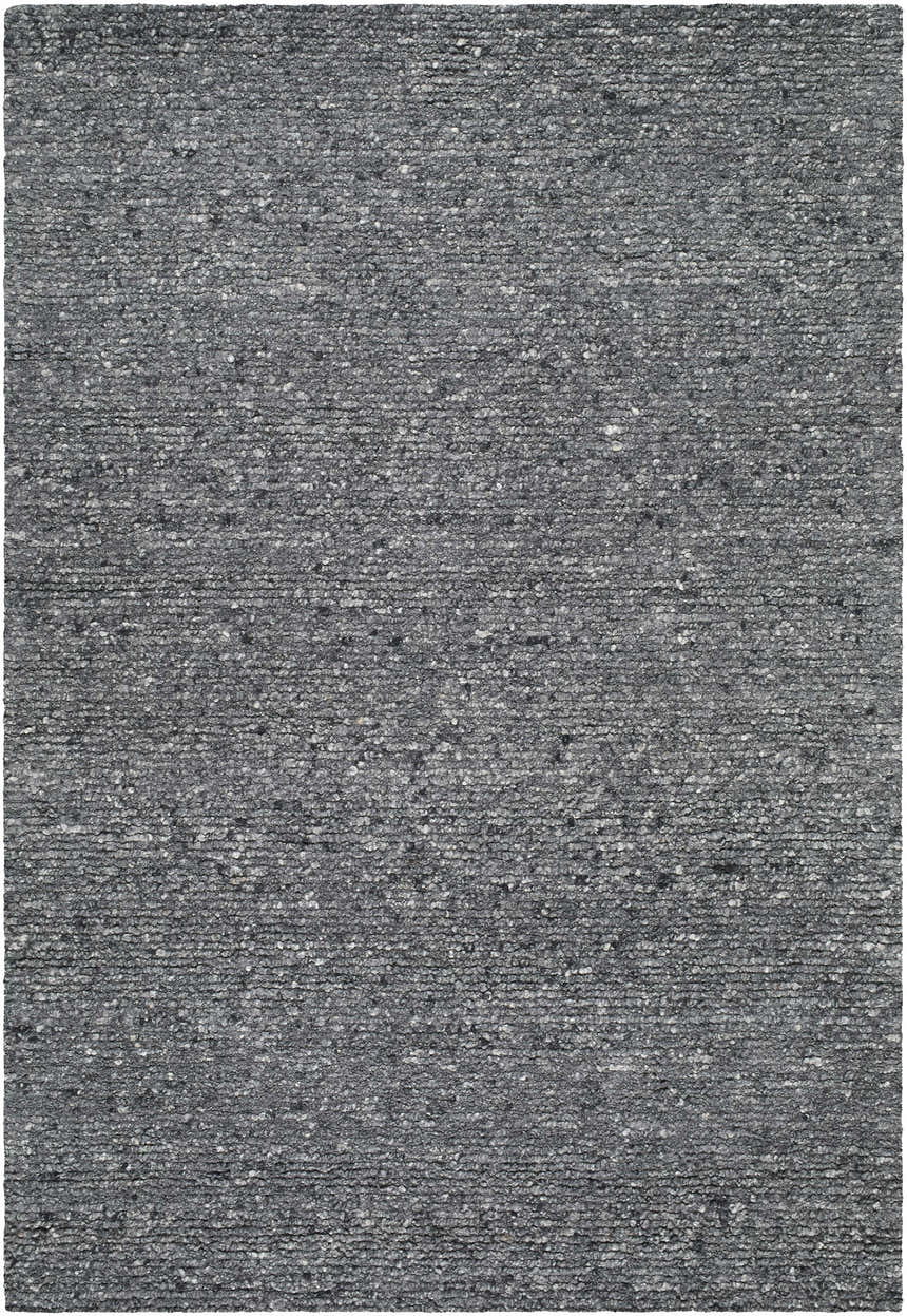 Close-up of the hand-tufted Winta Black Wool Area Rug, featuring gray, medium gray, and onyx tones. Design-Rectangle-537