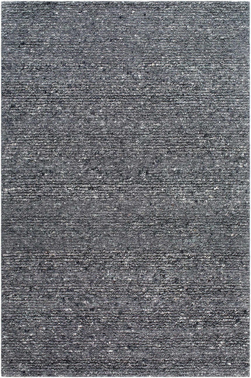 Close-up of the Winta Black Wool Area Rug, a hand-tufted rug with a subtle horizontal pattern in gray, medium gray, and onyx tones. Design-Rectangle-576
