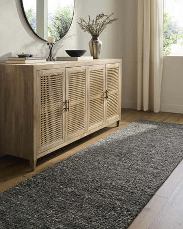 Entryway with a light wood cabinet and Winta Black Wool Area Rug runner on hardwood floors. Roomscene-Runner