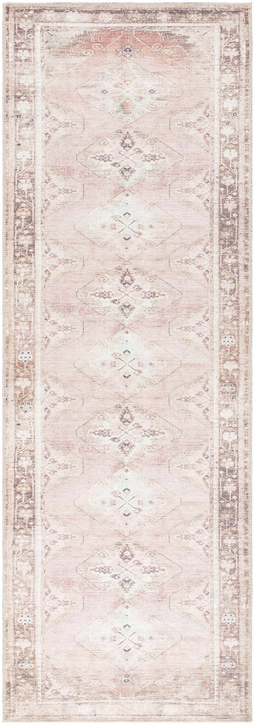 Close-up of the Ussun Washable Area Rug. Features a traditional diamond pattern in beige, dusty pink, and brown tones. Design-Runner-27710