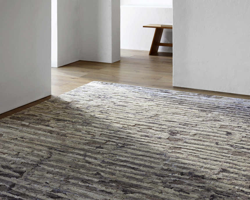 Contemporary living room with a Lowdham Premium Rug in black, cream, beige, gray, and taupe. Styleshot