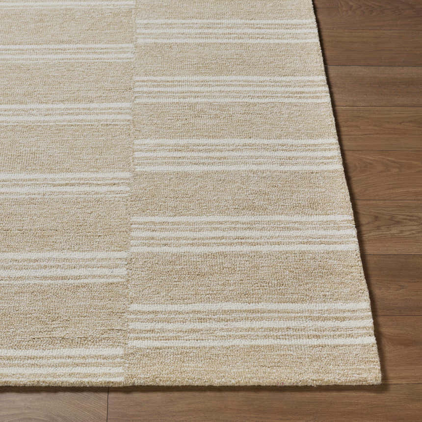 Close-up of the Argyro Area Rug showing its beige, ivory, and sandstone stripes and hand-tufted wool texture. Front