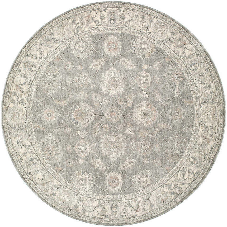 Close-up of the round Alinae Area Rug. Features a traditional floral pattern in cream, green, and light slate blue. Design-Round-53