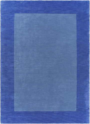 Close-up of a Macedon Blue Bordered Wool Rug, featuring a solid light blue center and a dark blue border. Design-Rectangle-811