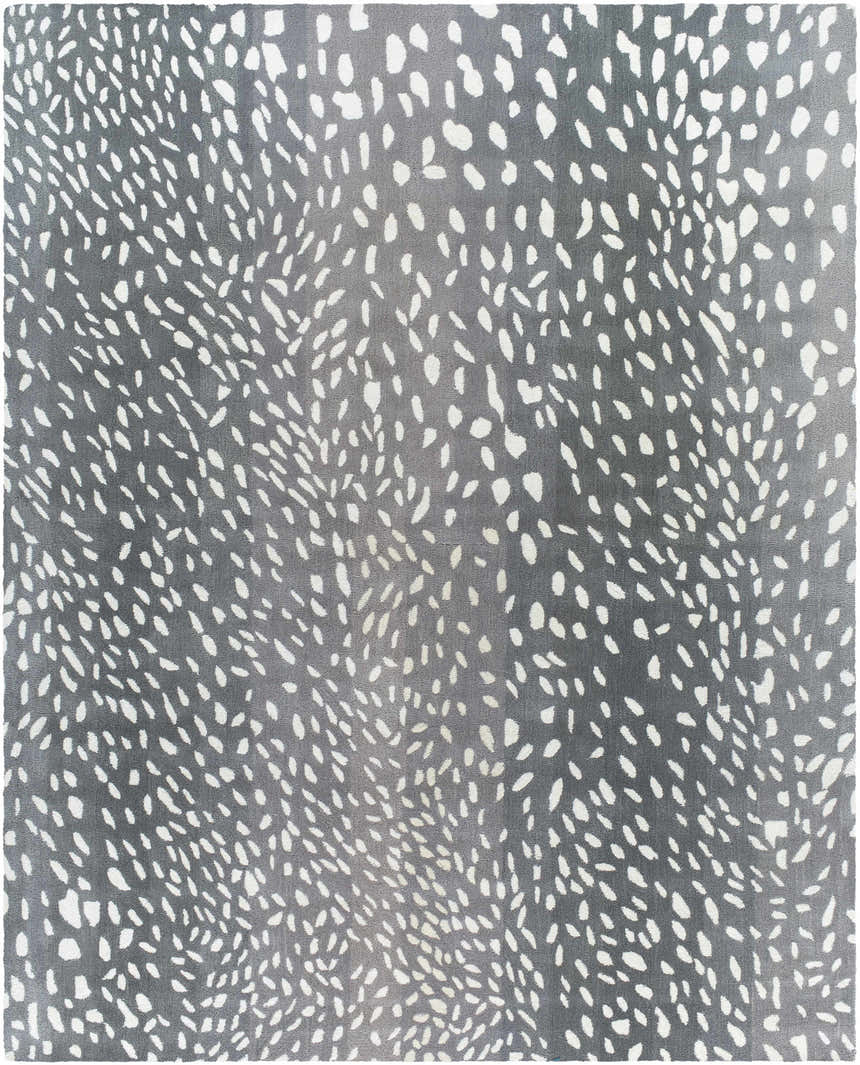 Close-up of the Athena Gray Giraffe Print Wool Rug. Cream spots on a gray, hand-tufted wool rug. Animal print. Design-Rectangle-811