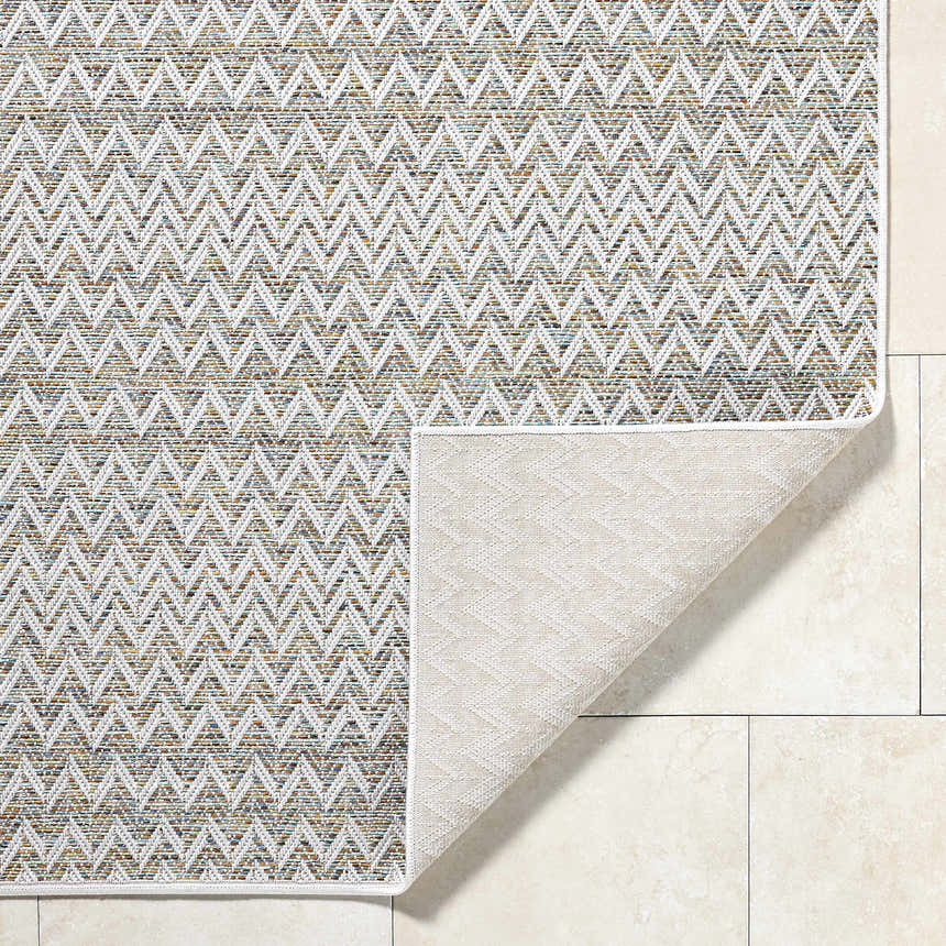 Close-up of the Alazne Ivory Area Rug showing its chevron pattern and ivory, sage, tan, and taupe colors. Fold