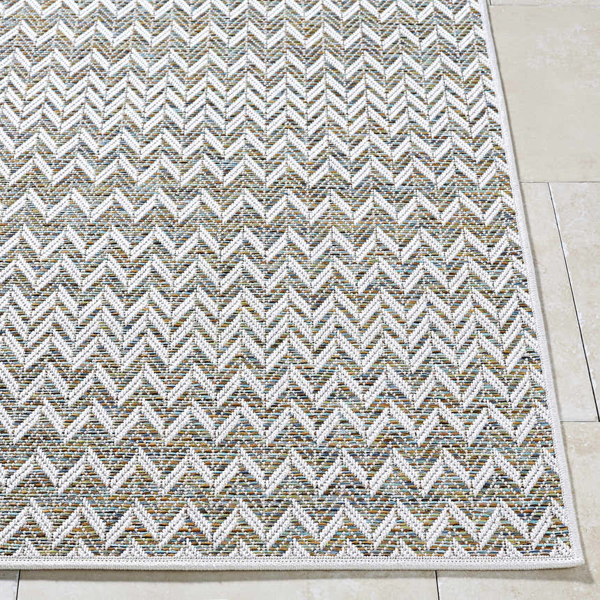 Close-up of the Alazne Ivory Area Rug featuring a white chevron pattern with sage, tan, and taupe hues. Front