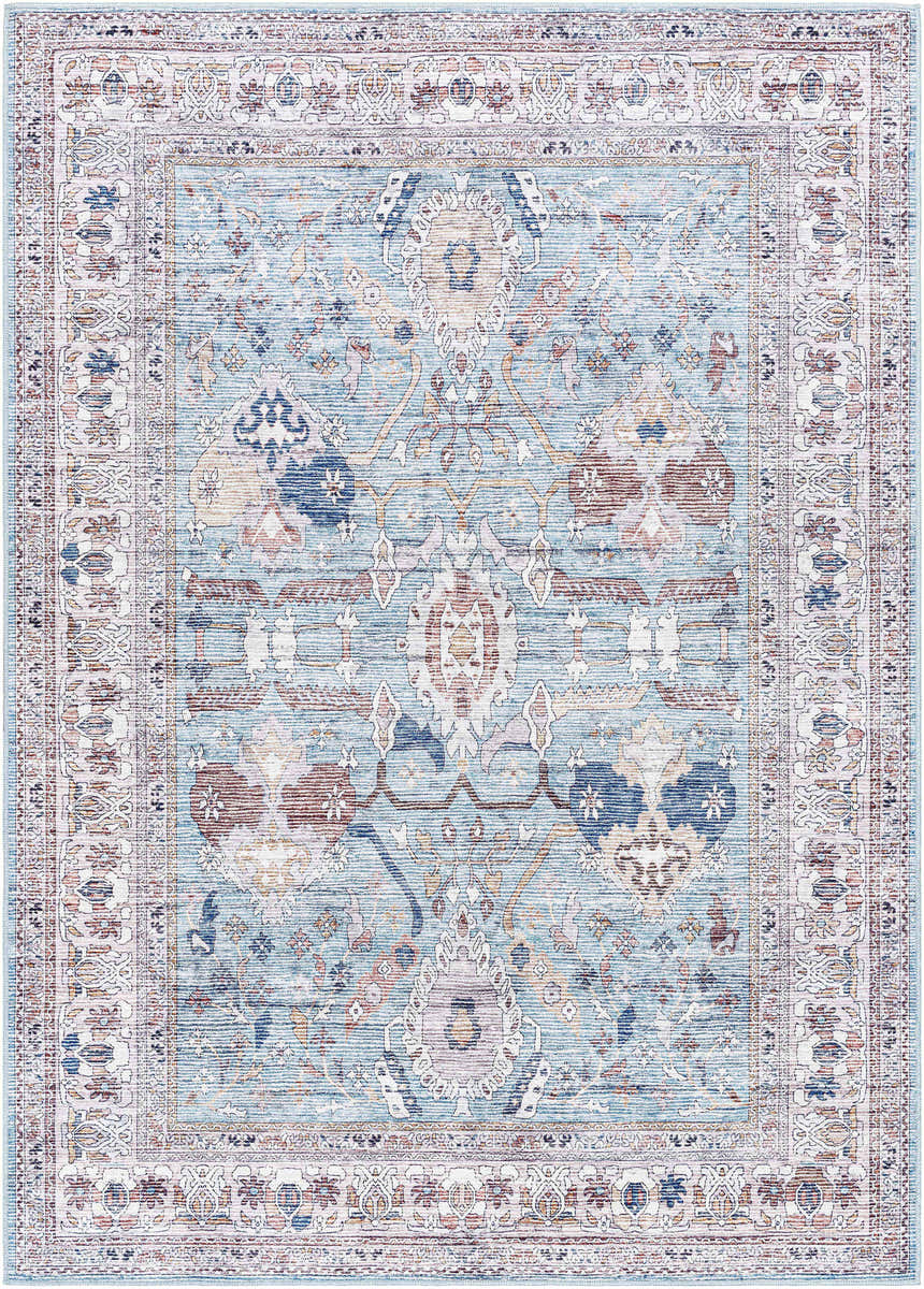 Close-up of the Matty Washable Area Rug. Traditional style rug in beige, cream, dark red, denim, navy, and rust. Design-Rectangle-5373
