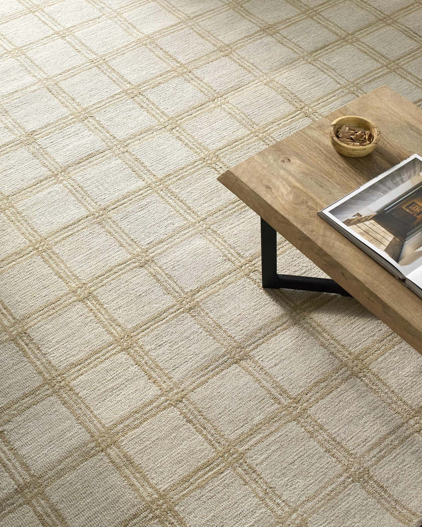 Close-up of the Adagio Area Rug. Beige wool rug with a cream and sandstone diamond pattern. Hand-tufted texture. Roomscene-Rectangle