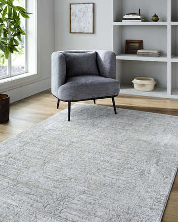 Entryway with gray chair on Anders Area Rug. Cream rug with light sage and gray traditional pattern. Farmhouse style. Roomscene-Rectangle