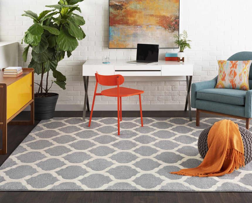 Home office with slate and cream Mongo Carpet, white desk, orange chair, and teal armchair. Roomscene-Rectangle