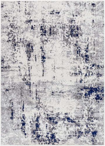 Close-up of the Marwa Area Rug featuring a contemporary charcoal, gray, and navy abstract pattern. Design-Rectangle