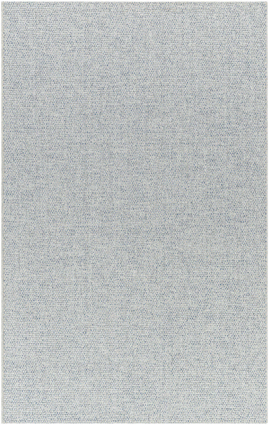 Close-up of the Mirit Area Rug showing a denim and light gray woven texture. Design-Rectangle-517