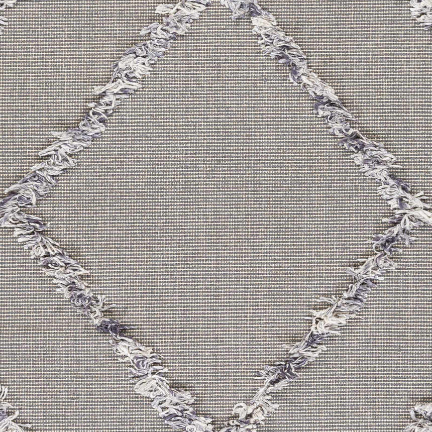 Close-up of the Needville Gray High-Low Rug showing its gray, off-white woven texture and raised diamond pattern with fringed edges. Swatch