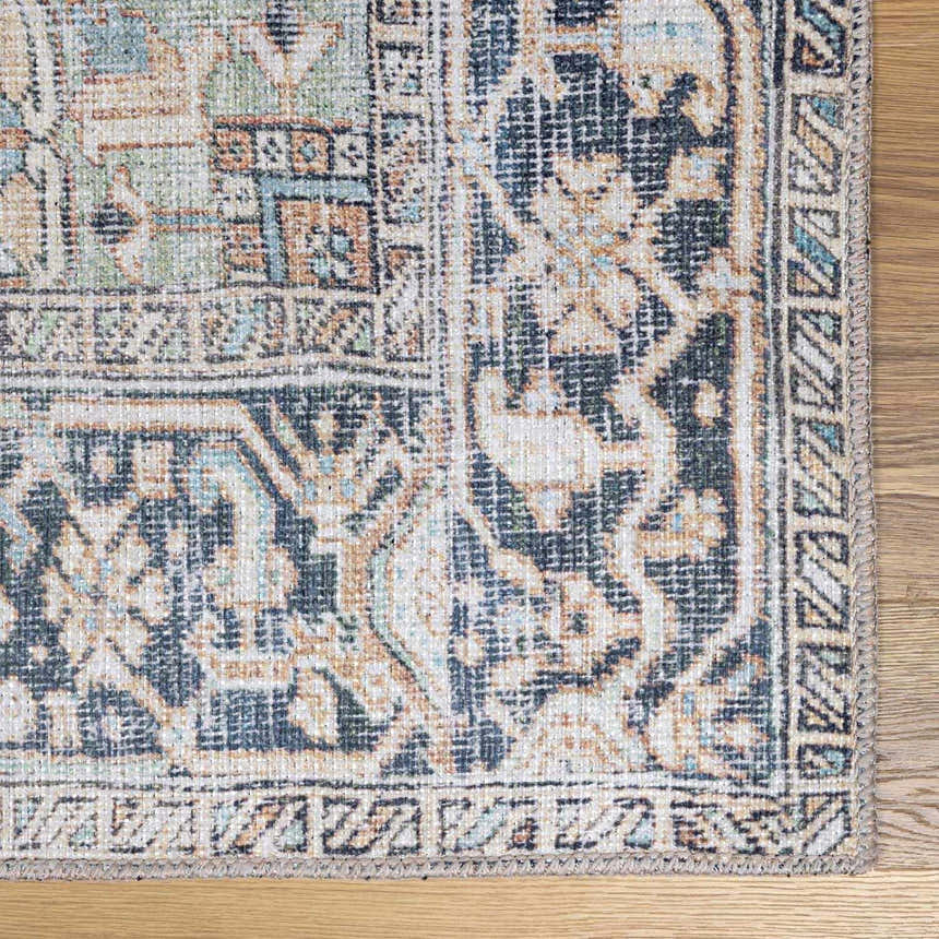 Close-up of Green Nisa Tumble Dry Washable Rug showing its traditional Persian-style pattern and colors: navy, orange, and seafoam. Swatch